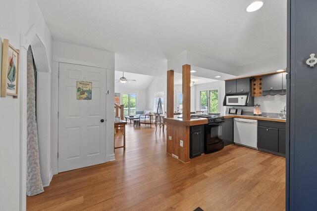 14 Wells Jones Rd, Waverly, OH 45690 - kitchen featuring white appliances, plenty of natural light, light wood-type flooring, and recessed lighting