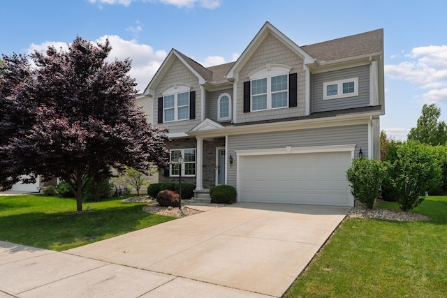 676 Ferguson Ave, Delaware, OH 43015 - view of front facade featuring a garage, a front lawn, driveway, and a shingled roof