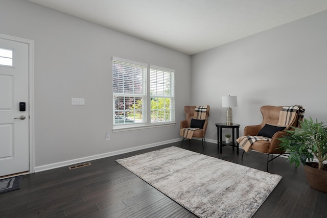 676 Ferguson Ave, Delaware, OH 43015 - sitting room with healthy amount of natural light, baseboards, and dark wood finished floors