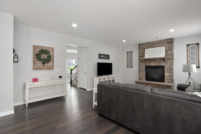 676 Ferguson Ave, Delaware, OH 43015 - living area with baseboards, dark wood-style flooring, a fireplace, and recessed lighting
