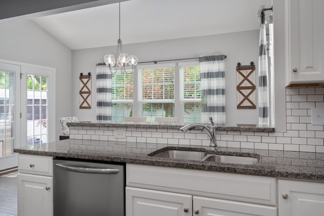 676 Ferguson Ave, Delaware, OH 43015 - kitchen with stainless steel dishwasher, a sink, healthy amount of natural light, and tasteful backsplash