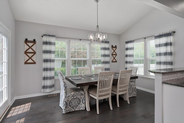 676 Ferguson Ave, Delaware, OH 43015 - dining room with vaulted ceiling, baseboards, dark wood finished floors, and a chandelier