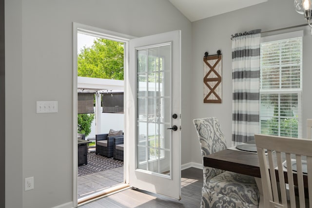 676 Ferguson Ave, Delaware, OH 43015 - doorway to outside featuring baseboards and wood finished floors