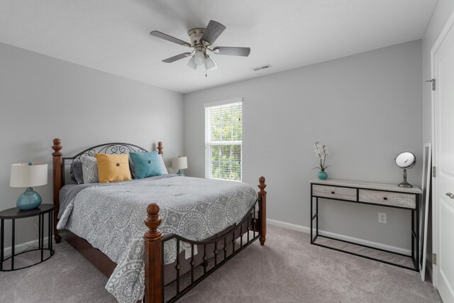 676 Ferguson Ave, Delaware, OH 43015 - carpeted bedroom with baseboards and a ceiling fan