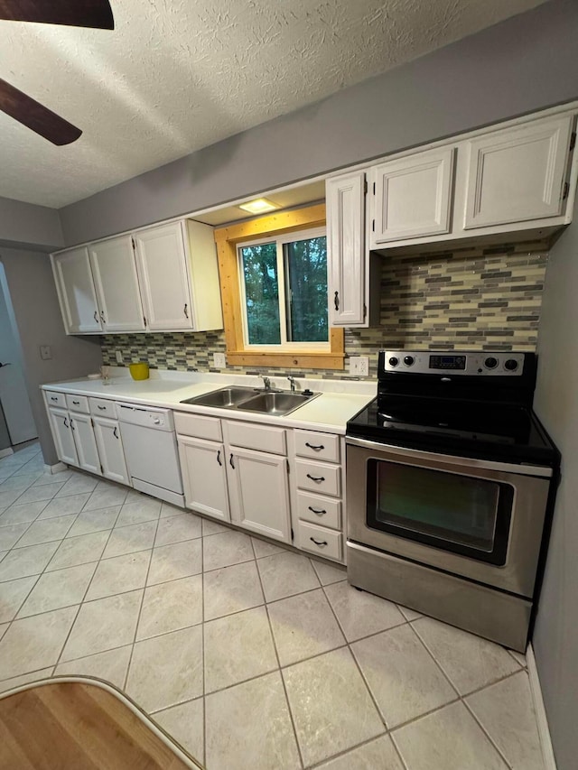 1442 Londondale Unit 3-3, Newark, OH 43055 - kitchen featuring stainless steel range with electric cooktop, a sink, white dishwasher, light tile patterned flooring, and backsplash