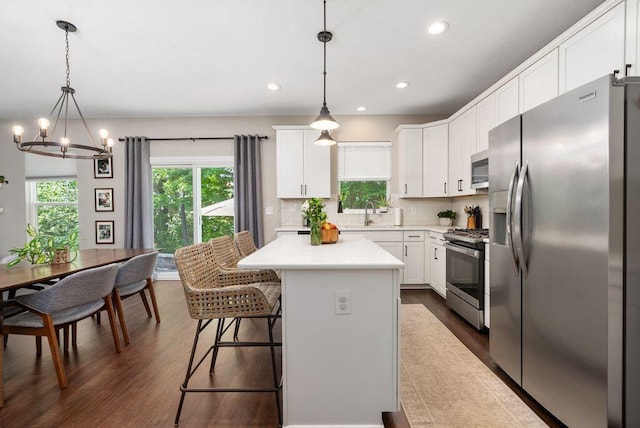 1211 Mcclish Ct, Grove City, OH 43123 - kitchen with stainless steel appliances, healthy amount of natural light, a chandelier, light countertops, and recessed lighting