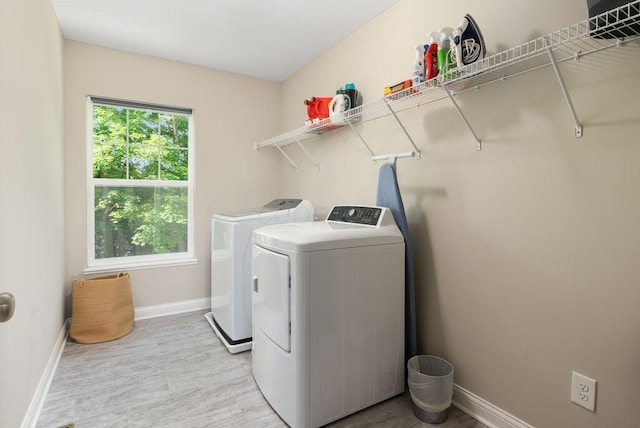 1211 Mcclish Ct, Grove City, OH 43123 - washroom with washing machine and clothes dryer, light wood finished floors, and baseboards