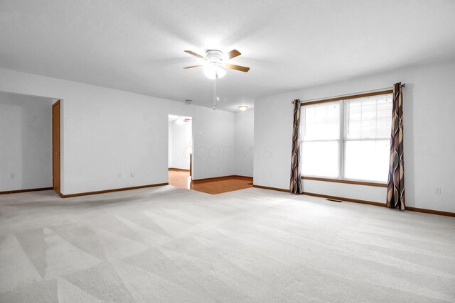 106 Kings Way W, Jefferson, OH 43162 - carpeted empty room with ceiling fan and baseboards