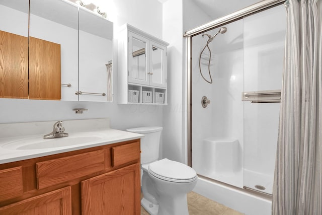 106 Kings Way W, Jefferson, OH 43162 - full bath with a stall shower, tile patterned flooring, vanity, and toilet