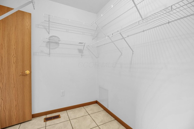 106 Kings Way W, Jefferson, OH 43162 - spacious closet with light tile patterned floors