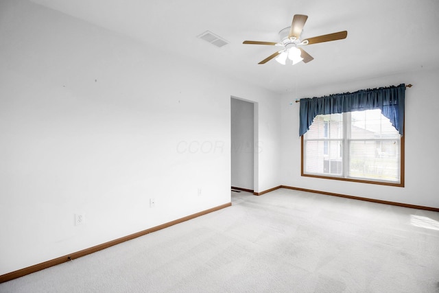 106 Kings Way W, Jefferson, OH 43162 - unfurnished room with baseboards, carpet floors, and a ceiling fan