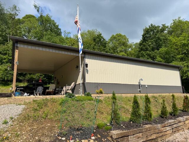 18644 Mcdonald Rd, Frazeysburg, OH 43822 - view of home's exterior featuring a carport