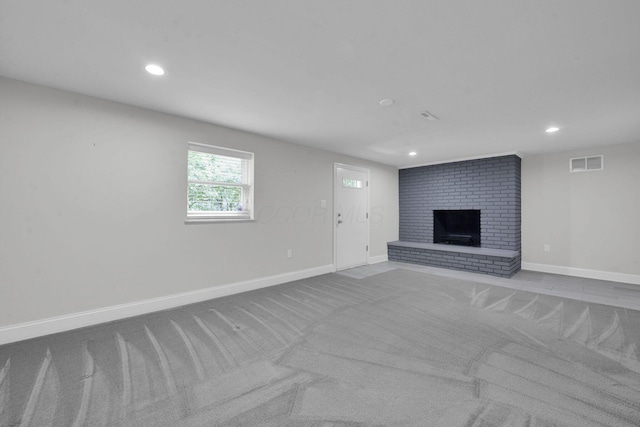 2608 Edgevale Rd, Columbus, OH 43221 - unfurnished living room with carpet floors, recessed lighting, and a fireplace