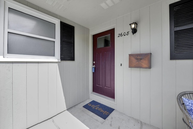 2608 Edgevale Rd, Columbus, OH 43221 - entrance to property featuring covered porch and board and batten siding