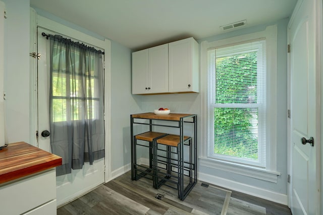 202 Boyleston Ave, Newark, OH 43055 - doorway to outside featuring dark wood-style flooring and baseboards