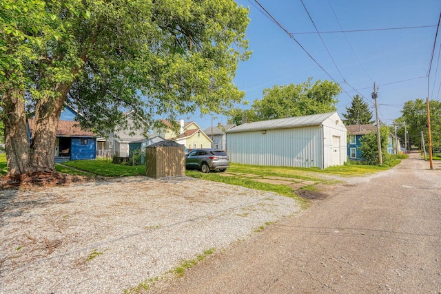 202 Boyleston Ave, Newark, OH 43055 - view of property exterior with an outdoor structure and metal roof