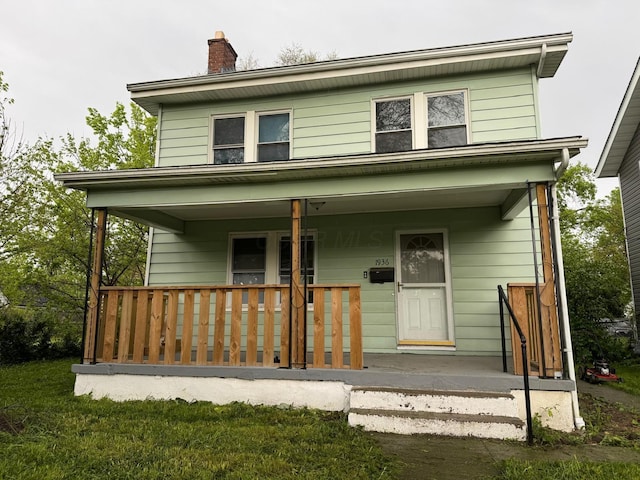 1936 Floral Ave, Columbus, OH 43223 - view of front facade with covered porch and a chimney