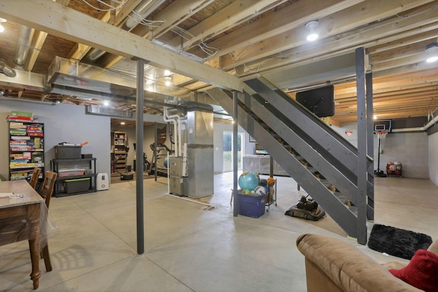 9559 Basil Rd NW, Baltimore, OH 43105 - basement with stairway and heating unit