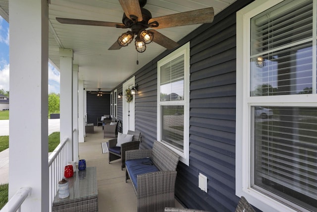 9559 Basil Rd NW, Baltimore, OH 43105 - covered porch with a ceiling fan