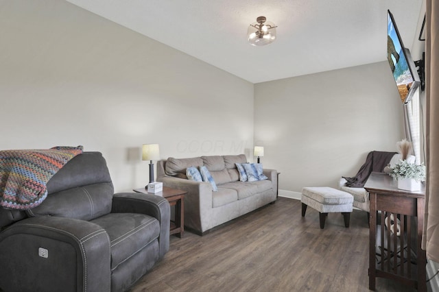 9559 Basil Rd NW, Baltimore, OH 43105 - living room featuring dark wood-style flooring and baseboards