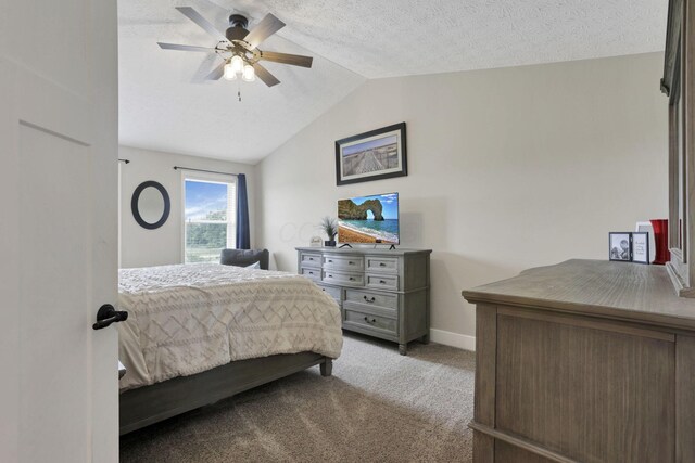 9559 Basil Rd NW, Baltimore, OH 43105 - carpeted bedroom featuring vaulted ceiling, baseboards, a ceiling fan, and a textured ceiling