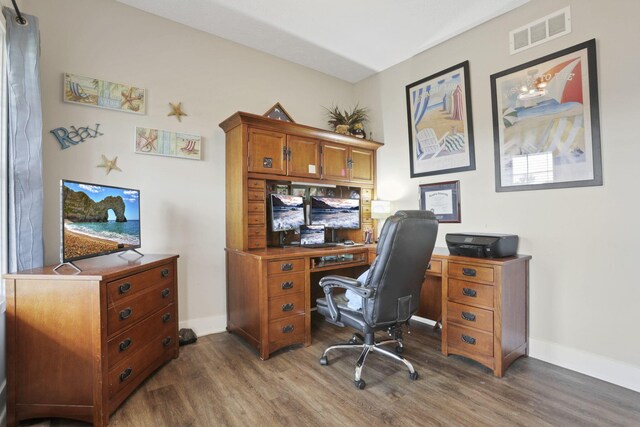 9559 Basil Rd NW, Baltimore, OH 43105 - office area featuring dark wood finished floors and baseboards