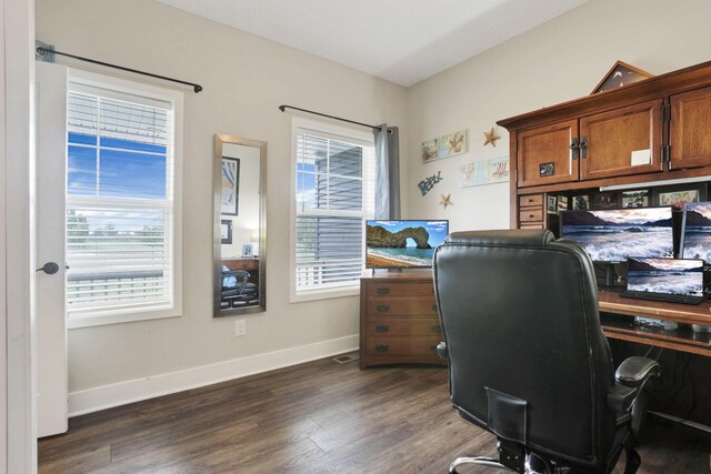 9559 Basil Rd NW, Baltimore, OH 43105 - office with dark wood finished floors and baseboards
