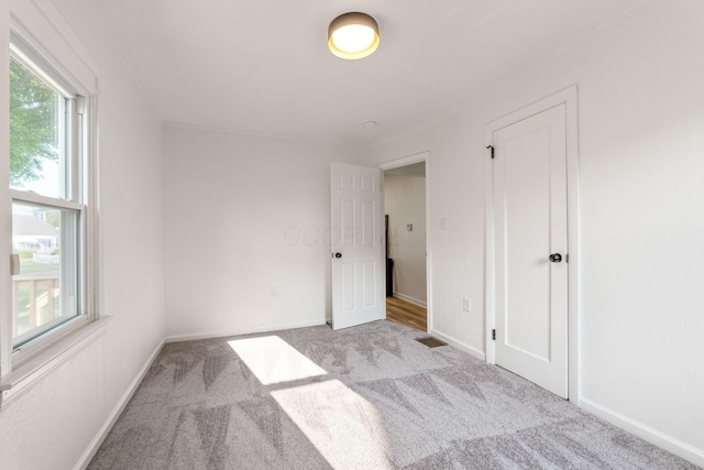 961 Davis Ave, Newark, OH 43055 - unfurnished room with plenty of natural light, carpet, and baseboards