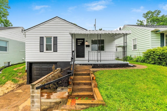 507 Brumfield Rd, Lancaster, OH 43130 - view of front of house with a porch, an attached garage, and a front yard