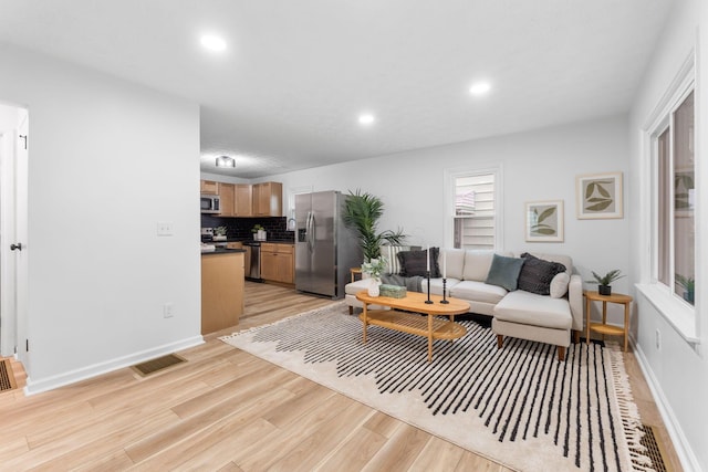 507 Brumfield Rd, Lancaster, OH 43130 - living area featuring light wood-type flooring, recessed lighting, and baseboards