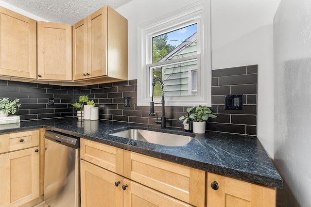 507 Brumfield Rd, Lancaster, OH 43130 - kitchen with stainless steel dishwasher, a sink, light brown cabinets, and decorative backsplash