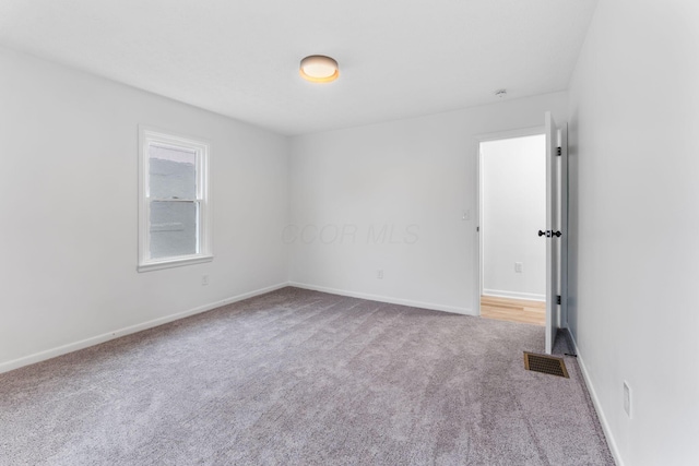 507 Brumfield Rd, Lancaster, OH 43130 - carpeted empty room with baseboards