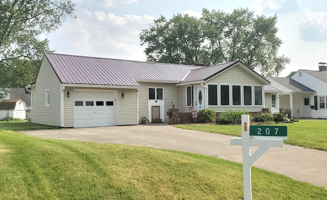 207 Newton Ave, Newark, OH 43055 - single story home with a garage, driveway, a front yard, and metal roof