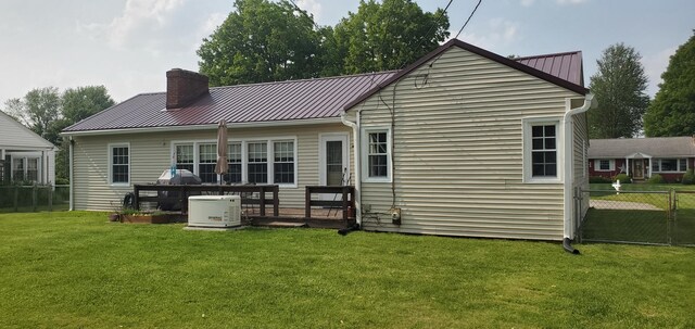 207 Newton Ave, Newark, OH 43055 - rear view of house with a chimney and metal roof