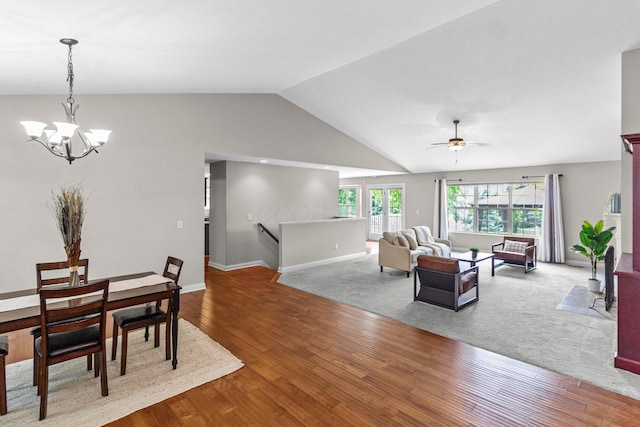 1245 Little Bear Loop, Lewis Center, OH 43035 - dining space with a chandelier, vaulted ceiling, wood finished floors, ceiling fan, and baseboards