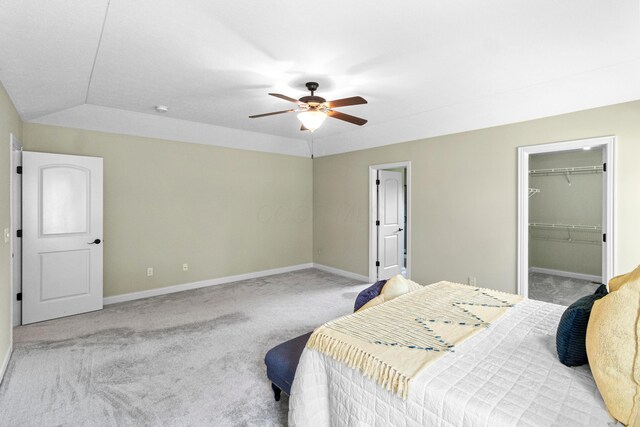 1245 Little Bear Loop, Lewis Center, OH 43035 - bedroom featuring baseboards, carpet flooring, a walk in closet, ceiling fan, and a closet
