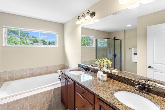 1245 Little Bear Loop, Lewis Center, OH 43035 - bathroom featuring double vanity, a stall shower, and a garden tub