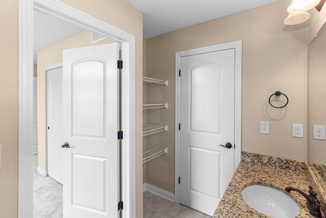 1245 Little Bear Loop, Lewis Center, OH 43035 - bathroom featuring vanity, baseboards, and tile patterned flooring