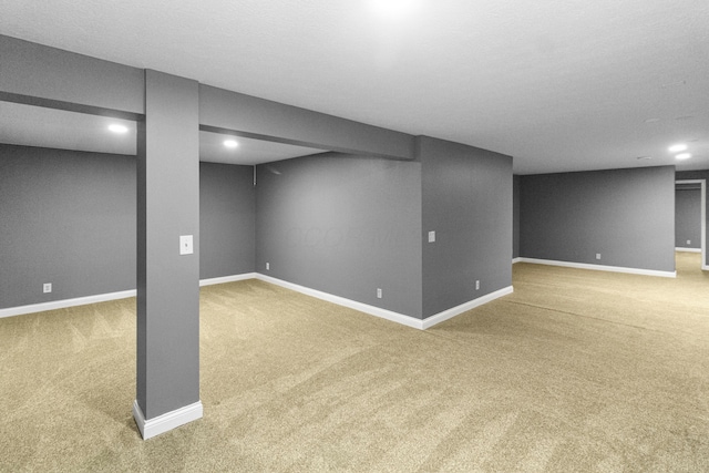 1245 Little Bear Loop, Lewis Center, OH 43035 - finished below grade area featuring light carpet, baseboards, and recessed lighting