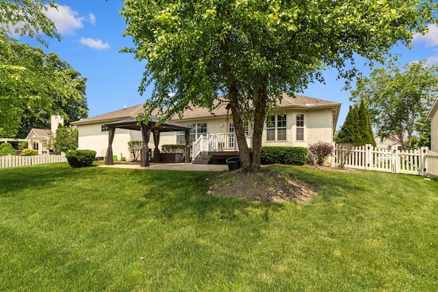1245 Little Bear Loop, Lewis Center, OH 43035 - rear view of house with a gazebo and stucco siding