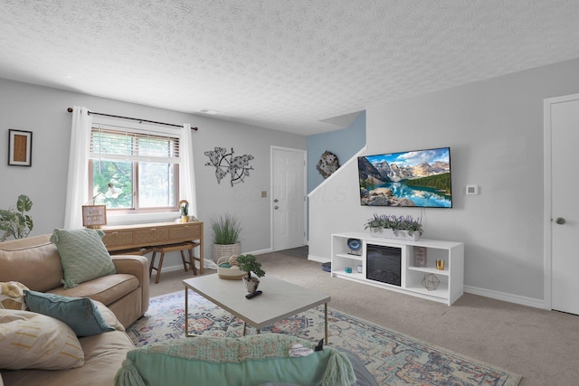 3195 Summerdale Ln, Columbus, OH 43221 - living room featuring carpet flooring, baseboards, and a textured ceiling