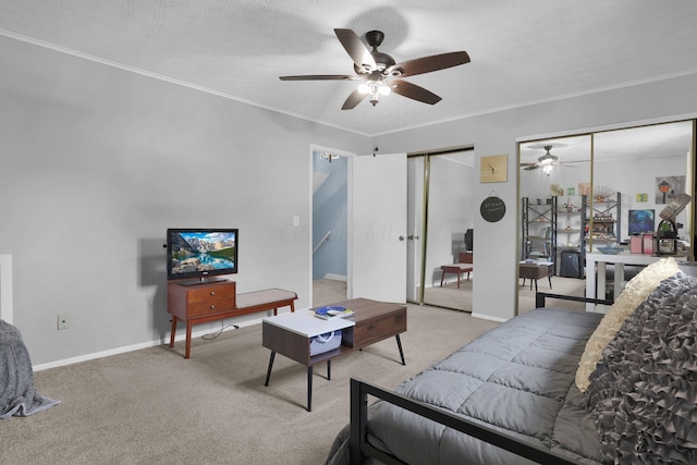 3195 Summerdale Ln, Columbus, OH 43221 - living room featuring a ceiling fan, light carpet, ornamental molding, and baseboards