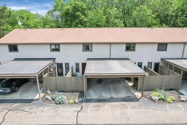3195 Summerdale Ln, Columbus, OH 43221 - back of house with stucco siding and roof with shingles