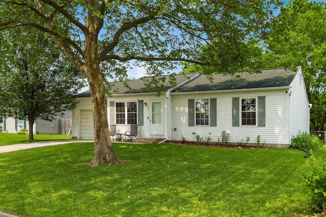 133 Blendon Rd, West Jefferson, OH 43162 - ranch-style home with concrete driveway, an attached garage, a front lawn, and roof with shingles
