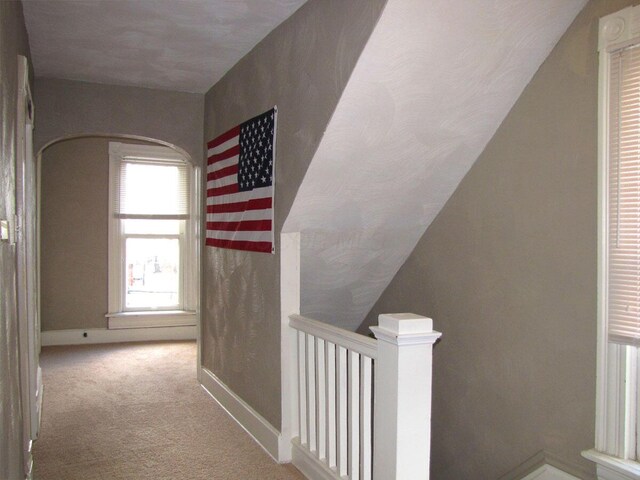 236 E Lane Ave, Columbus, OH 43201 - staircase featuring carpet flooring and arched walkways