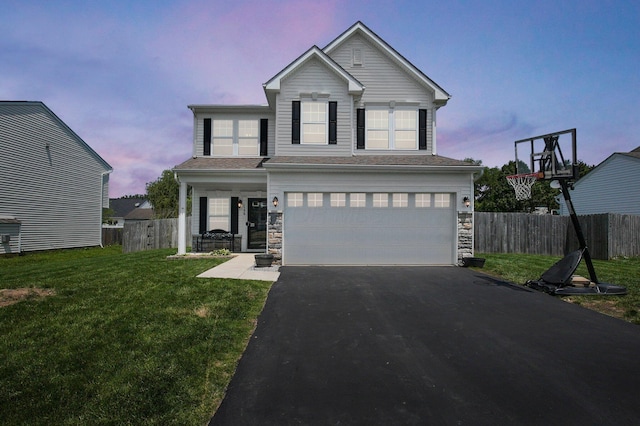 1598 Metcalfe Ave, Obetz, OH 43207 - view of front facade with asphalt driveway, an attached garage, a porch, and stone siding