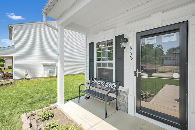 1598 Metcalfe Ave, Obetz, OH 43207 - property entrance with a lawn and a porch