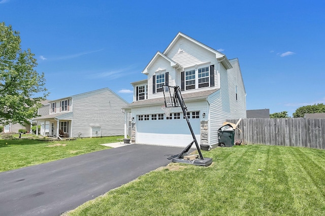 1598 Metcalfe Ave, Obetz, OH 43207 - traditional-style home with a garage, asphalt driveway, and stone siding