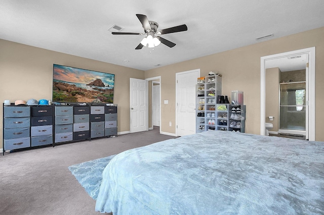 1598 Metcalfe Ave, Obetz, OH 43207 - carpeted bedroom featuring ceiling fan, ensuite bathroom, and baseboards