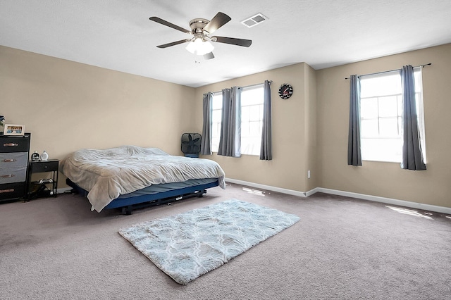 1598 Metcalfe Ave, Obetz, OH 43207 - carpeted bedroom featuring baseboards and ceiling fan